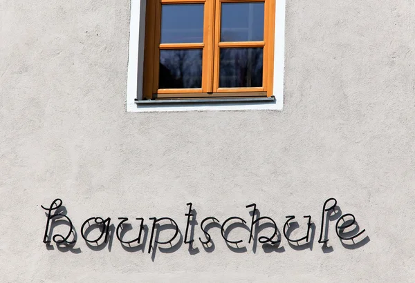 Metal lettering on a major school — Stock Photo, Image