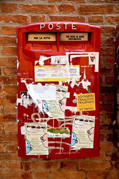 Advertising leaflets on an italian post box — Stock Photo, Image