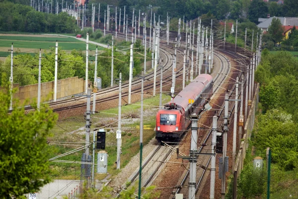 Train on railroad tracks — Stock Photo, Image