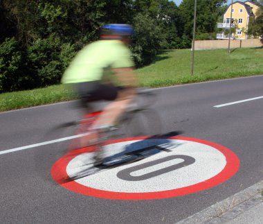 Speed limit printed on the asphalt clipart