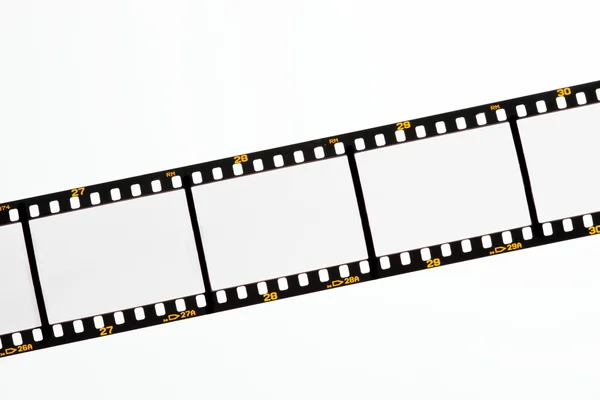Diapositiva tiras de película con marcos vacíos —  Fotos de Stock
