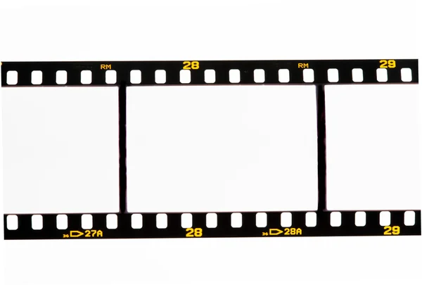 Deslize tiras de filme com molduras vazias — Fotografia de Stock