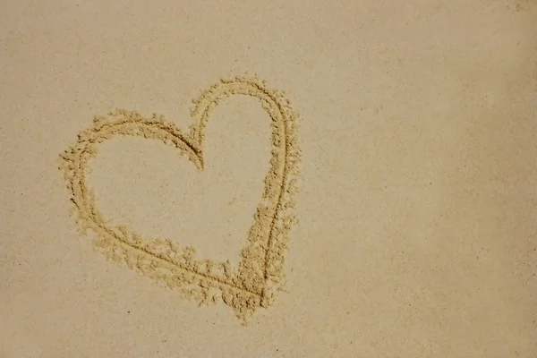 Знаки на песке — стоковое фото