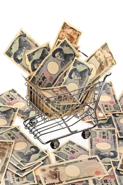 Japanese yen banknote with shopping basket — Zdjęcie stockowe
