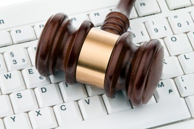 Gavel and keyboard. legal certainty on the interne clipart