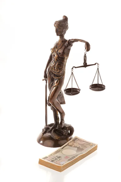 Justice and the yen. symbol for legal costs — Stock Photo, Image