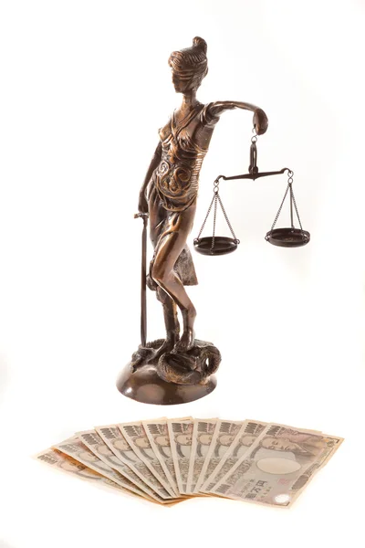 Sprawiedliwości i jena. Symbol kosztów sądowych — Zdjęcie stockowe