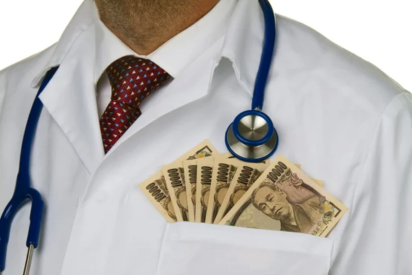 Doctor with japanese yen bank notes — Stock Photo, Image