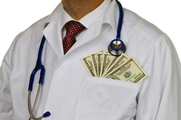Doctor with dollar bills — Stock Photo, Image