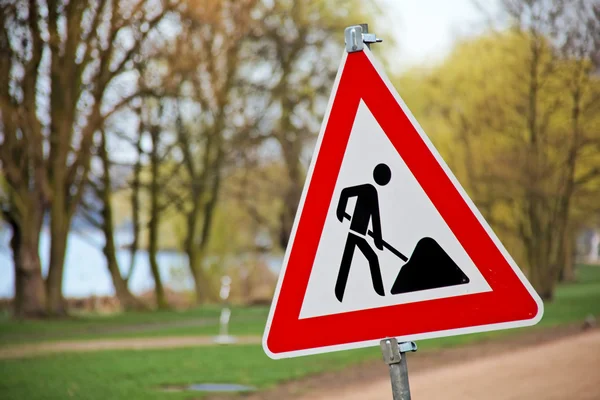 Sign and traffic sign at construction site — Stock Photo, Image