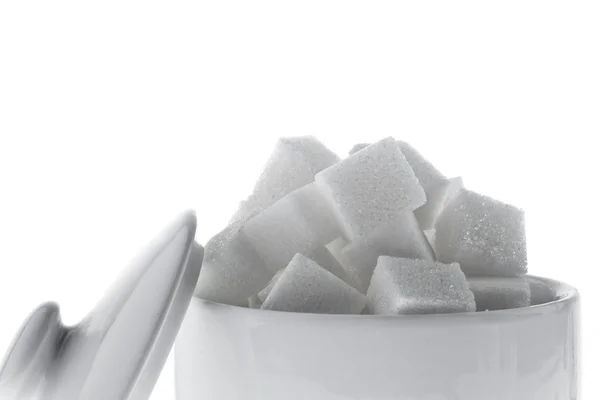 Muchos trozos de azúcar para un dulce — Foto de Stock