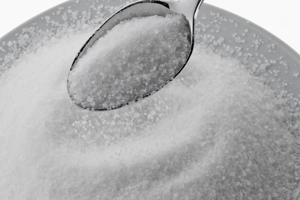 Хрустальный сахар на ложке — стоковое фото