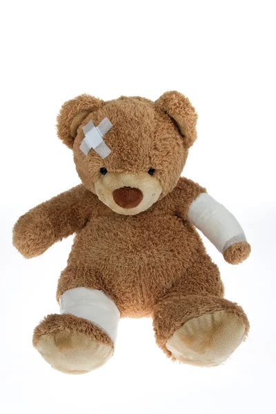 Bear with bandage after an accident — Stock Photo, Image