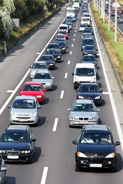 Traffic jam in the road with cars on a highway — Stock Photo, Image