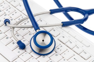 Computer keyboard and stethoscope. it for physicia clipart
