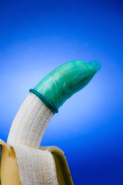 Condom with banana. icon for prevention and aids. clipart