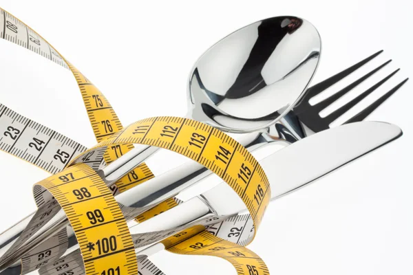 stock image Cutlery with tape. symbol diet.