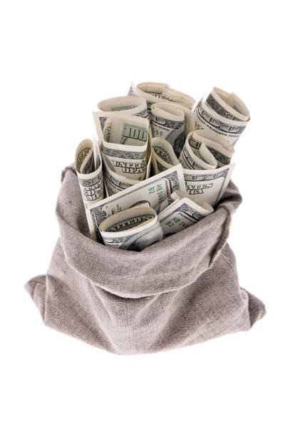 Billetes de dólares estadounidenses en un saco — Foto de Stock