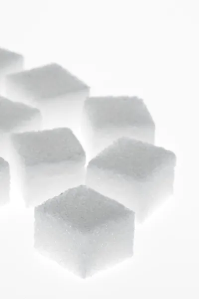 Muchos trozos de azúcar para un dulce — Foto de Stock