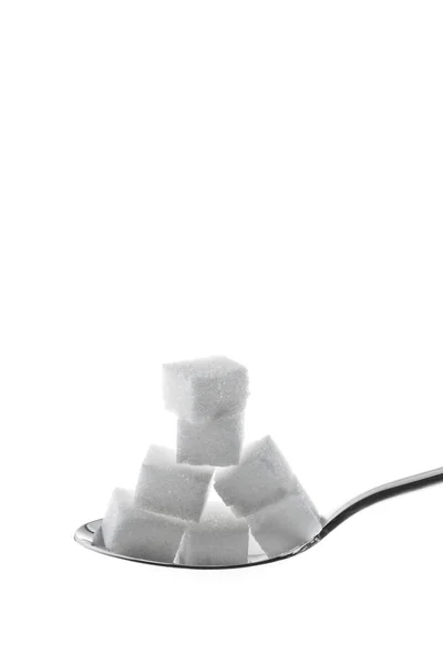 Många bitar av socker för en söt — Stockfoto