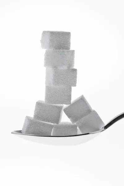 砂糖は甘いのための多くの部分 — ストック写真