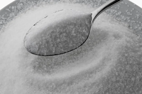 Açúcar de cristal em uma colher — Fotografia de Stock