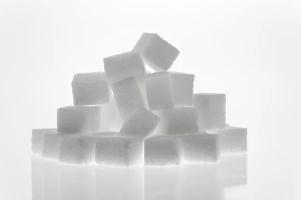 Muchos trozos de azúcar para un dulce —  Fotos de Stock