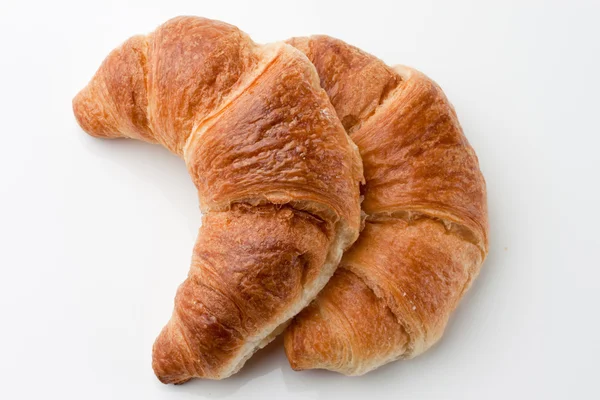 A reggeli süteményeket croissant — Stock Fotó