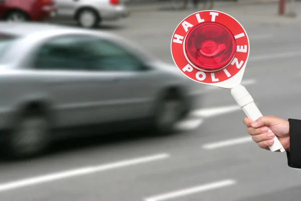 Policeman hand with stop sign — Stock Photo, Image