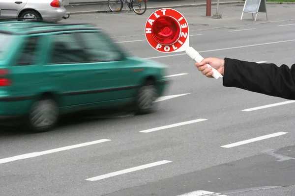 Policeman hand with stop sign — Stock Photo, Image
