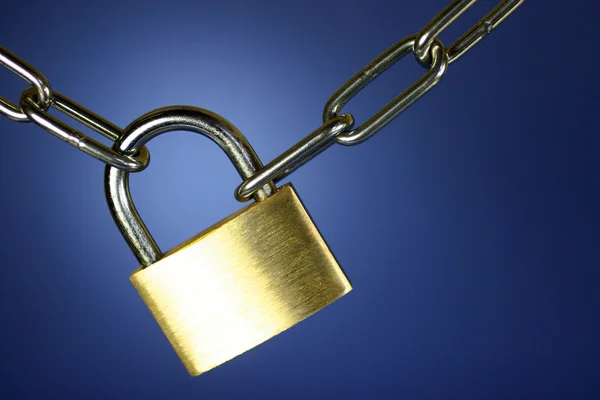 Key lock locked with a chain — Stock Photo, Image