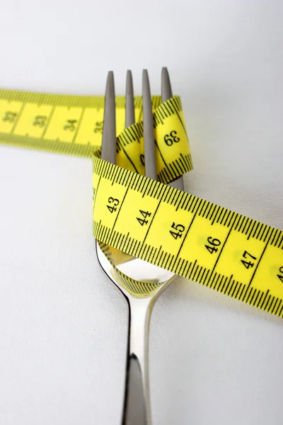 Ruban à mesurer et fourchette — Photo
