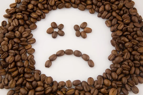 Sorriso feito de grãos de café — Fotografia de Stock