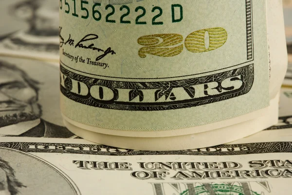 Contas de dólar dobradas — Fotografia de Stock