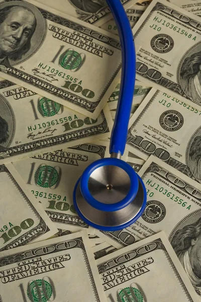 Stethoscope and dollars — Stock Photo, Image