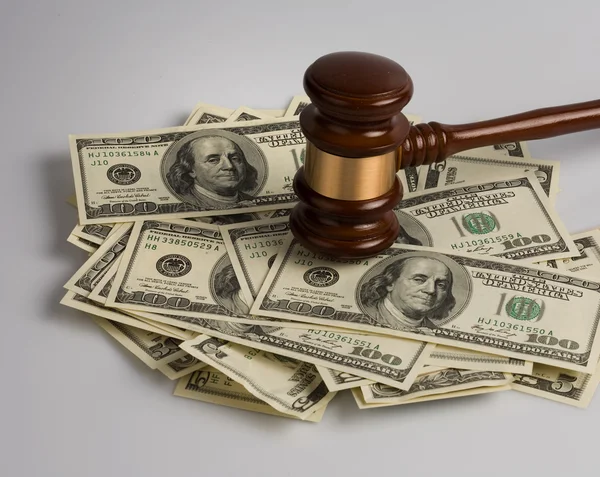 Law gavel on a stack of American money. — Stock Photo, Image