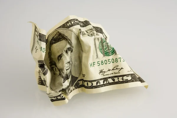 Crumpled money. Isolated over white. — Stock Photo, Image