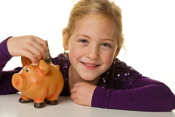 Kind mit Sparschwein. Dollar, sparen — Stockfoto