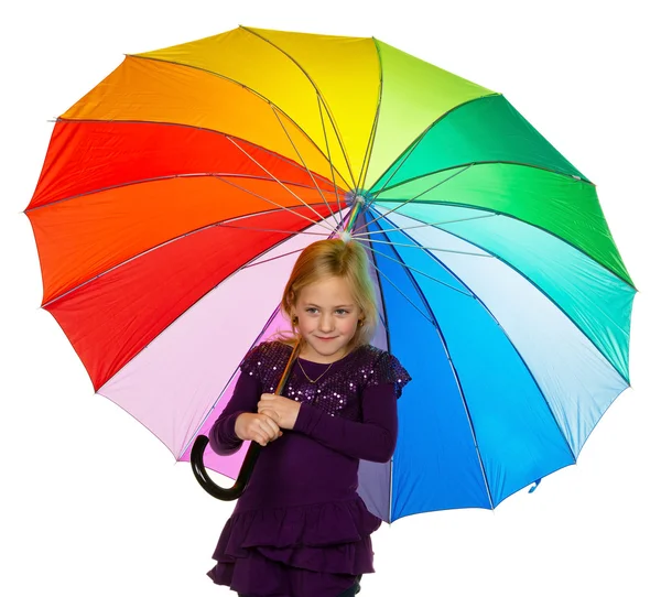 Criança com um guarda-chuva colorido — Fotografia de Stock