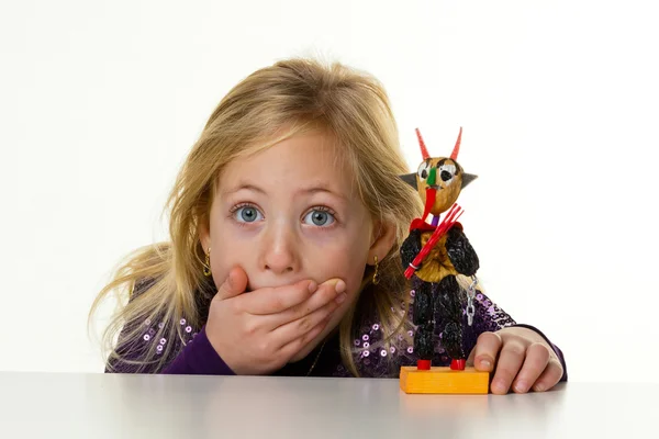 Little kid with a krampus — Stock Photo, Image