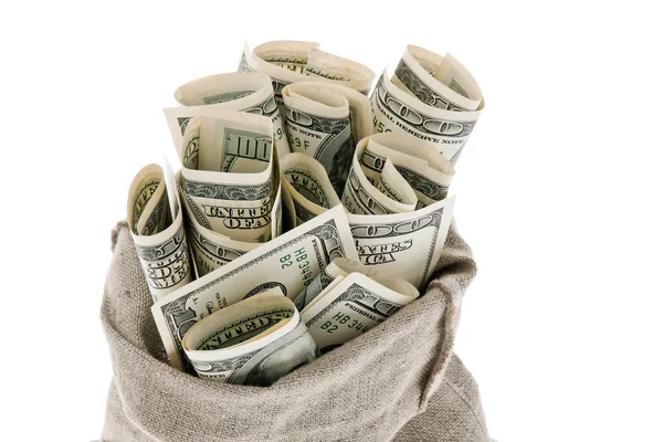 Billetes de dólares estadounidenses en un saco — Foto de Stock