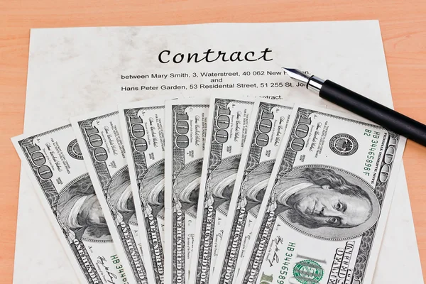 Dollar currency notes and english contract — Stock Photo, Image