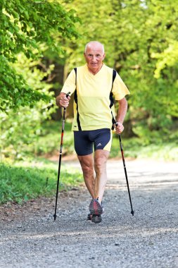 Senior training for fitness walking nordic clipart