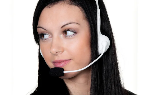 Mujer con auriculares en servicio al cliente . — Foto de Stock