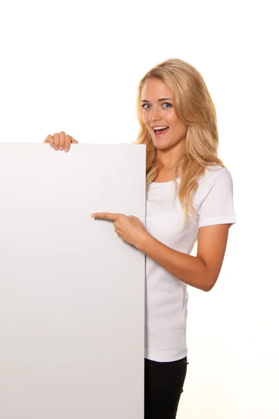 Woman with empty poster to advertise — Stock Photo, Image