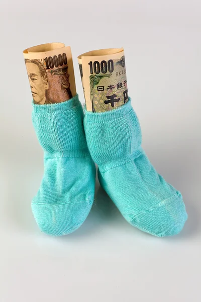 Children's socks with yen bills — Stock Photo, Image