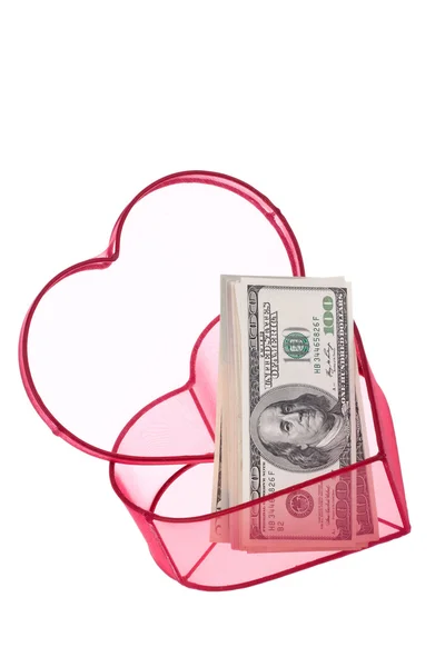 Dolar faturaları bir kalp içinde — Stok fotoğraf