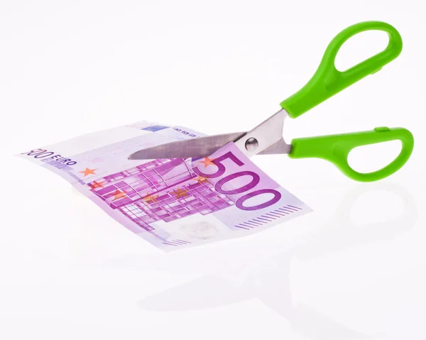 Billetes en euros y tijeras —  Fotos de Stock