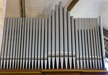 Section of an organ in a church clipart