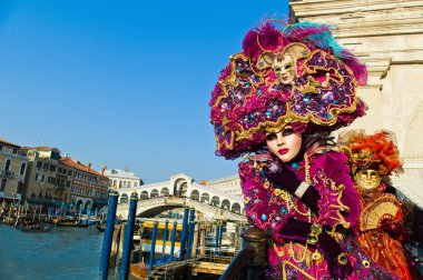 Carnival in the unique city of venice in italy clipart